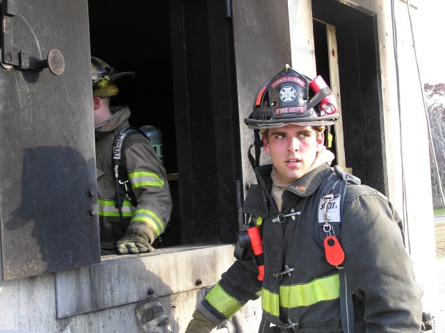 Junior Firefighter Chris Wells attends RIT training at the South Kingstown burn building 11/11/06.